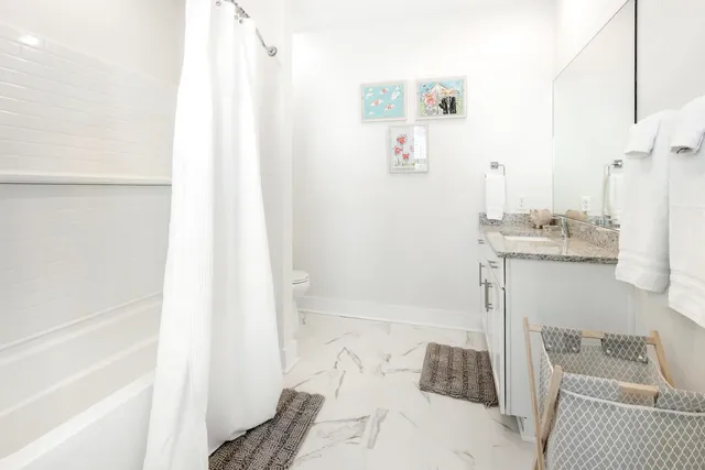 a bedroom with a bed and a cabinets