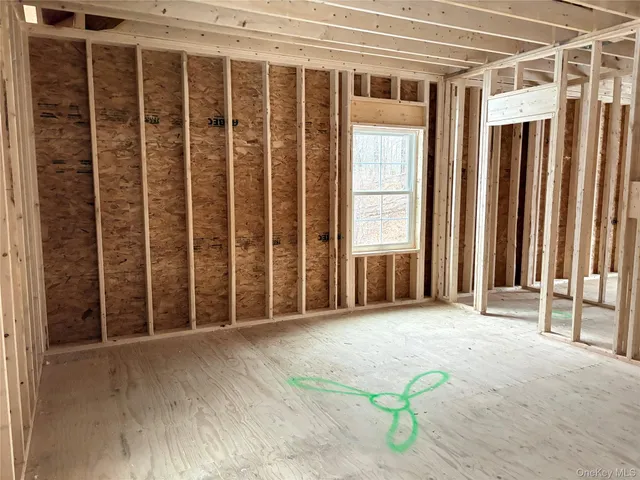 a bathroom with a shower and a sink