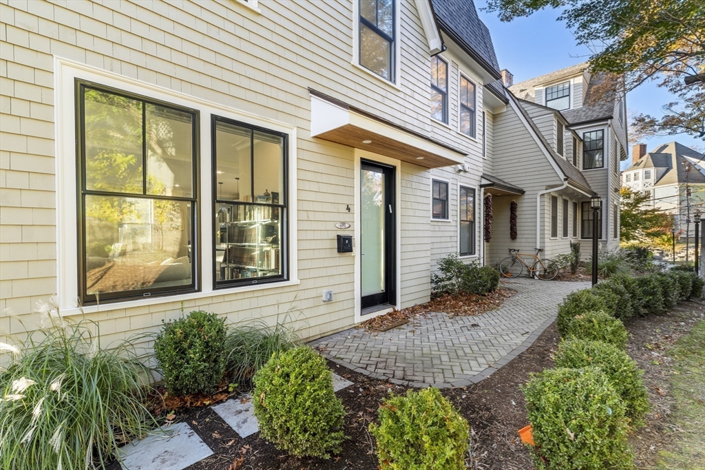 24 Selkirk Road, Unit 244 Boston, MA 02135 - Photo 27 of 31 a front view of a house with garden