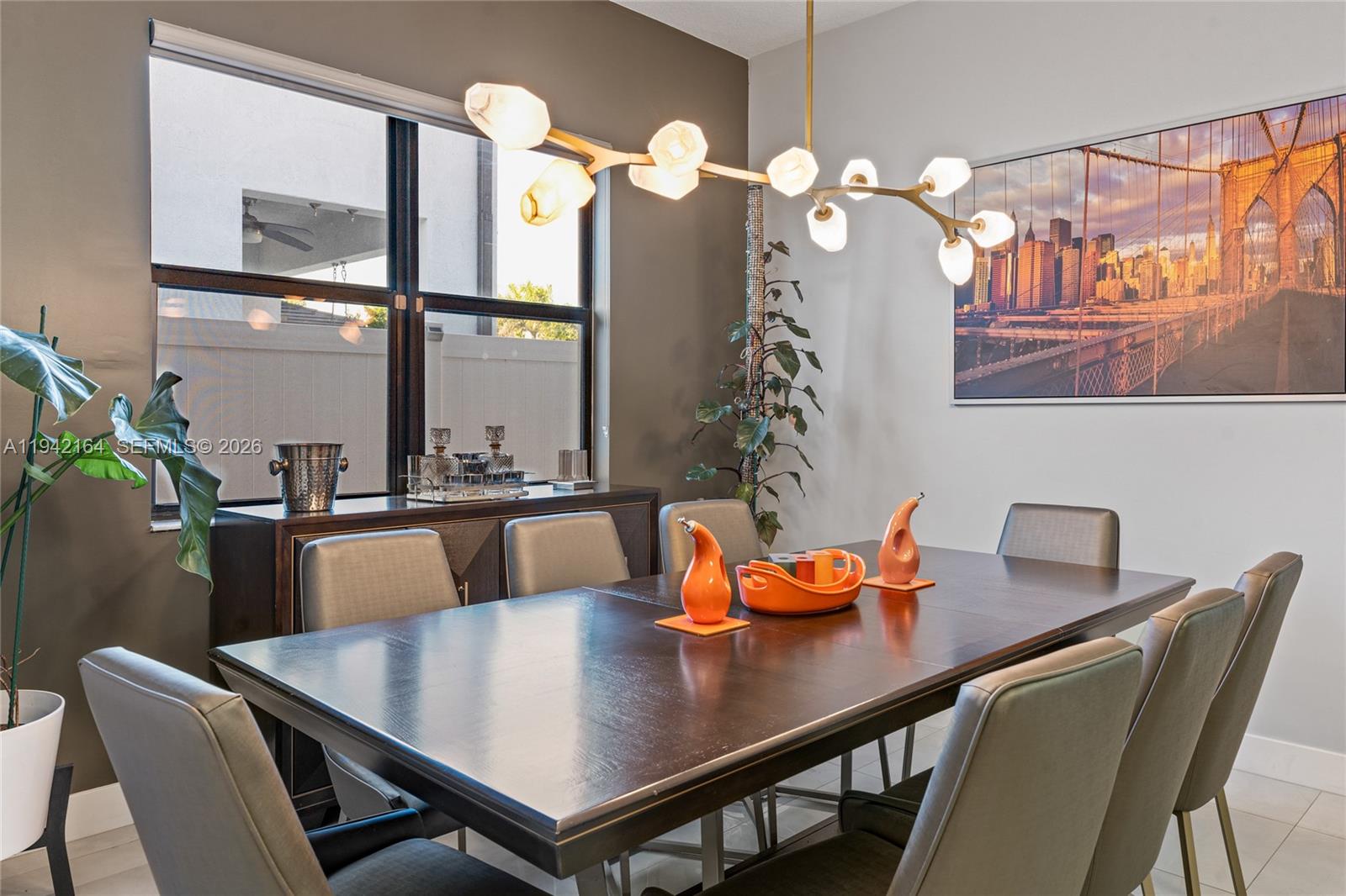 17375 Southwest 41st Street Miramar, FL 33029 - Photo 14 of 53 a view of a dining room with furniture and a chandelier
