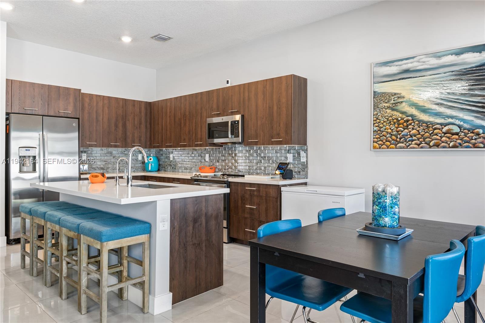 17375 Southwest 41st Street Miramar, FL 33029 - Photo 18 of 53 a kitchen with a sink cabinets and counter space