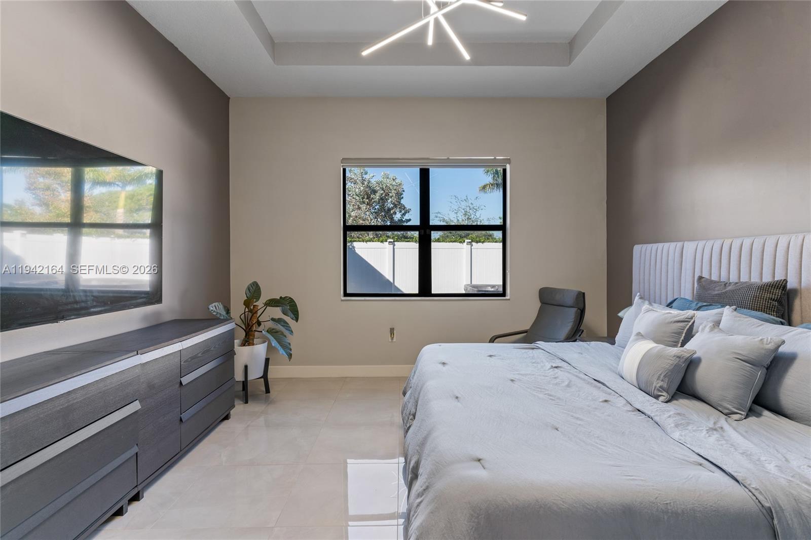 17375 Southwest 41st Street Miramar, FL 33029 - Photo 29 of 53 a bedroom with a bed and a window
