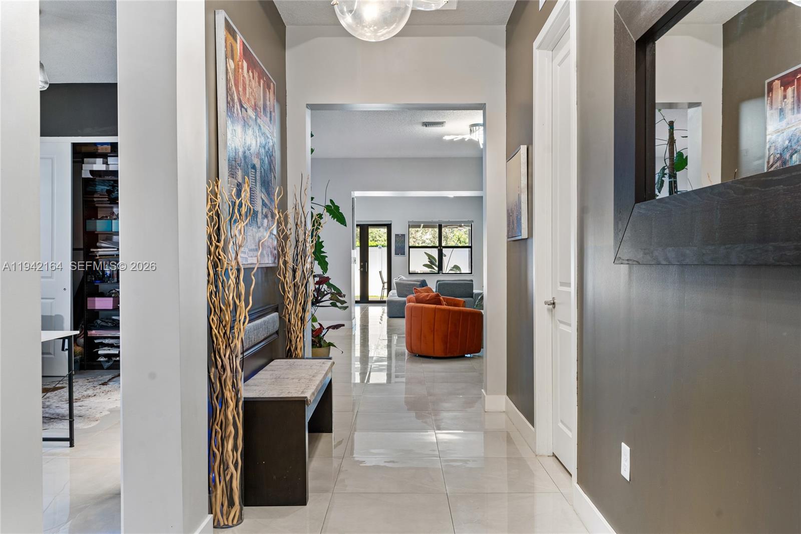 17375 Southwest 41st Street Miramar, FL 33029 - Photo 4 of 53 view of hall way with mirror and stairs