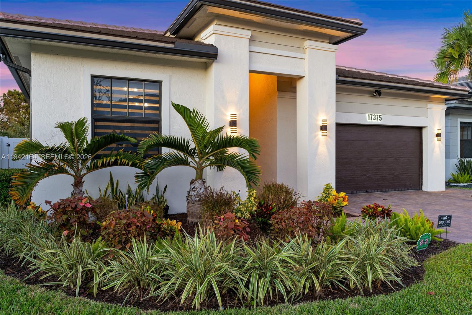 17375 Southwest 41st Street Miramar, FL 33029 - Photo 43 of 53 a front view of a house with a yard