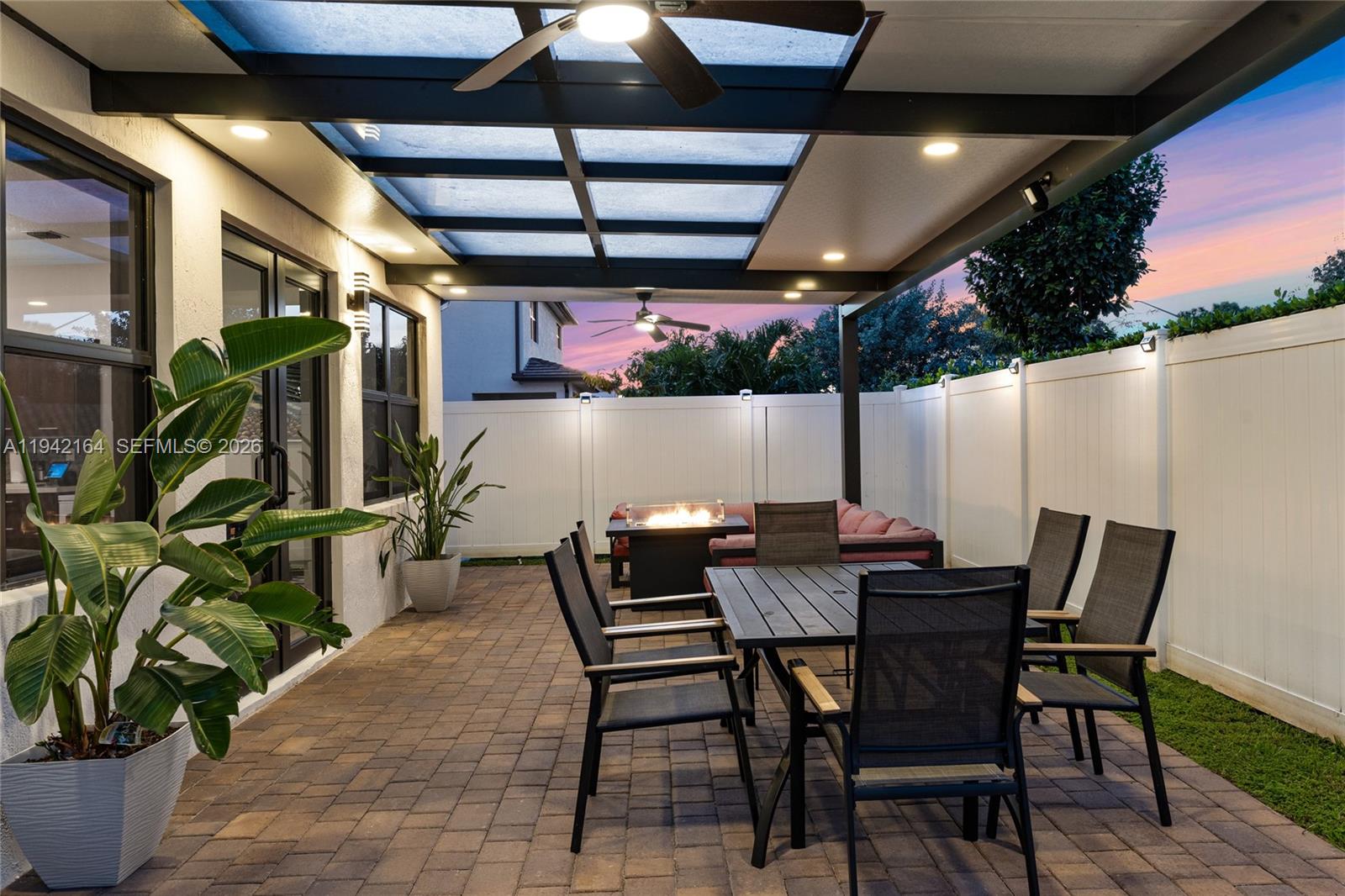 17375 Southwest 41st Street Miramar, FL 33029 - Photo 44 of 53 a view of an outdoor dining space with a table and chairs