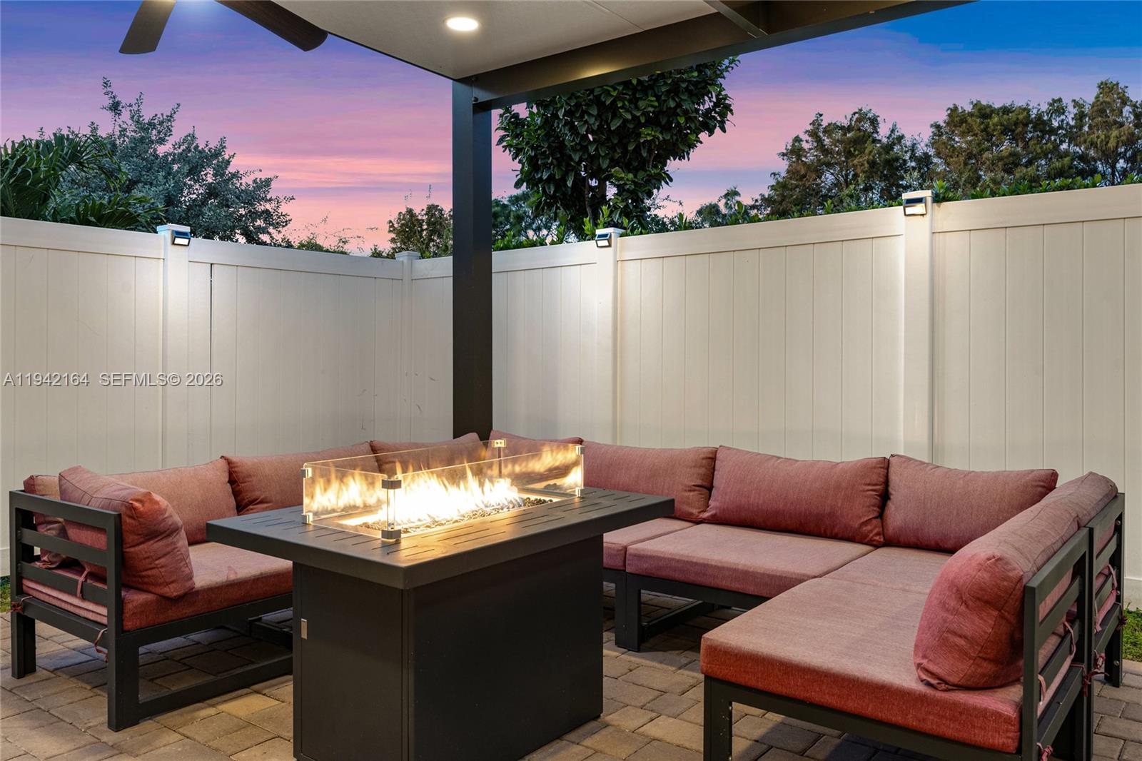 17375 Southwest 41st Street Miramar, FL 33029 - Photo 45 of 53 a outdoor sitting area with furniture and a potted plant