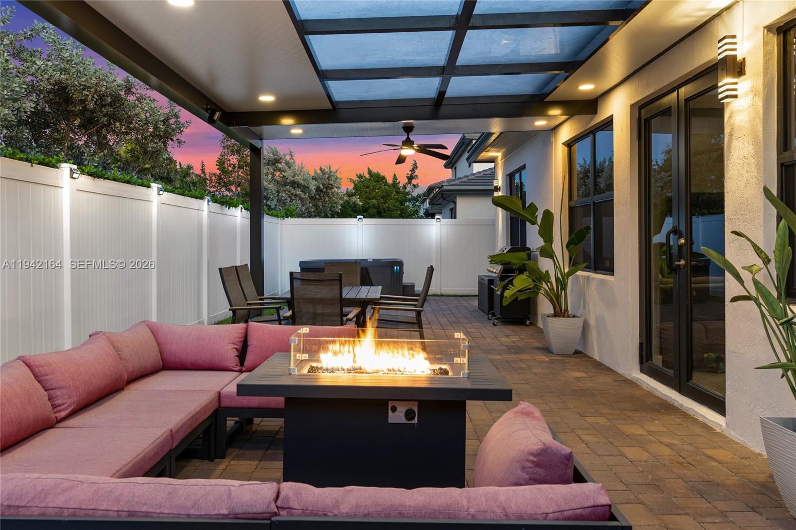 17375 Southwest 41st Street Miramar, FL 33029 - Photo 47 of 53 a outdoor living space with furniture and a potted plant