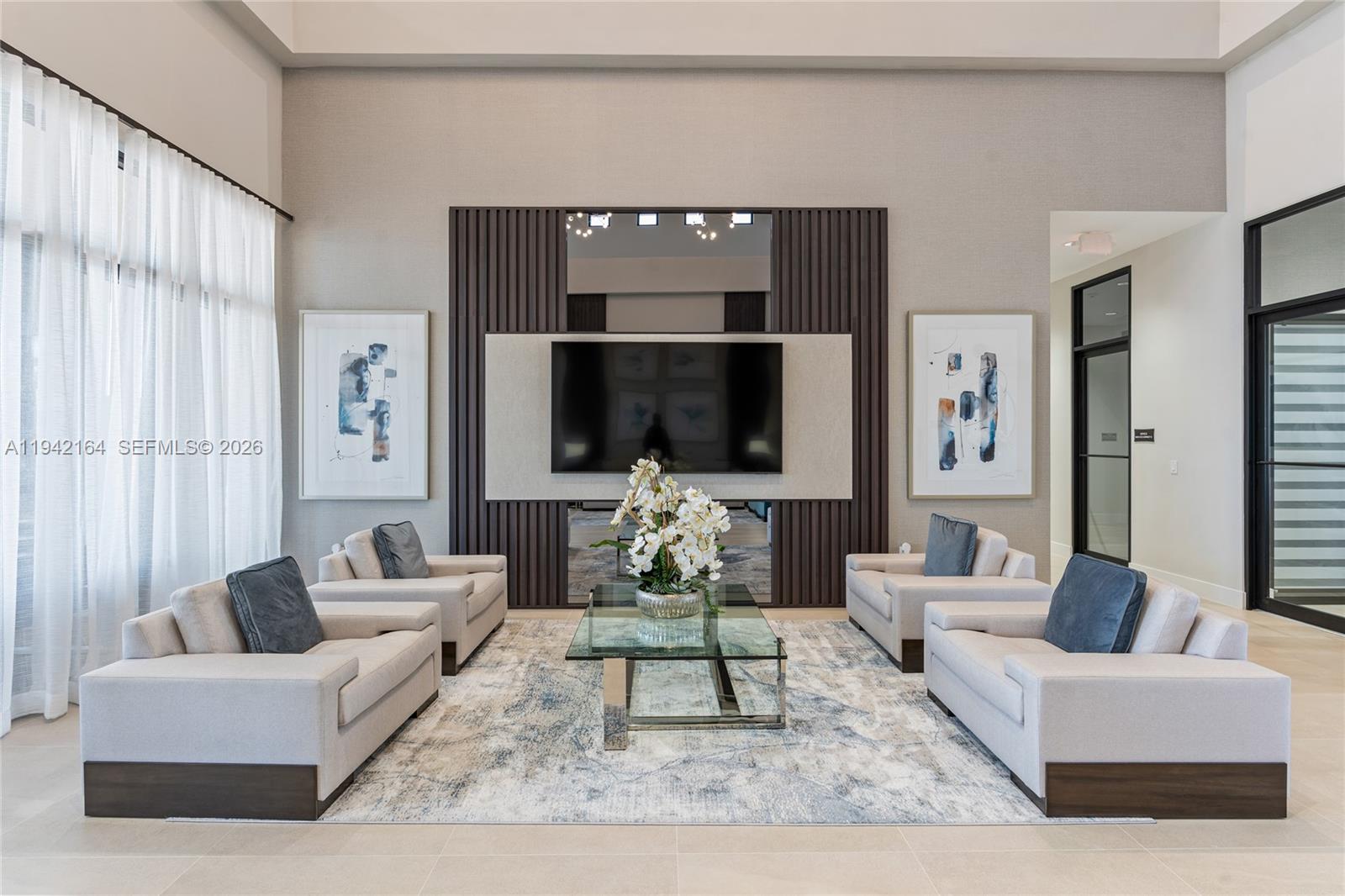 17375 Southwest 41st Street Miramar, FL 33029 - Photo 50 of 53 a living room with furniture and a flat screen tv