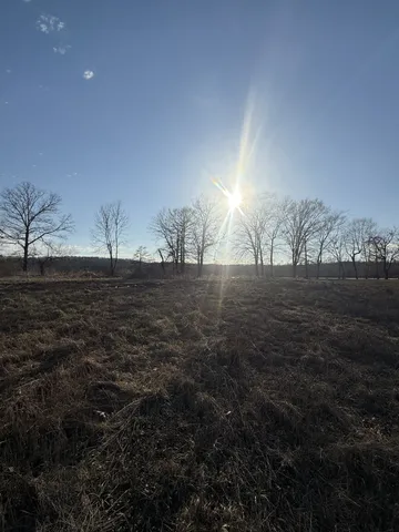a view of outside space and a lake view