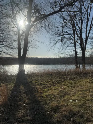 a view of a lake from a balcony