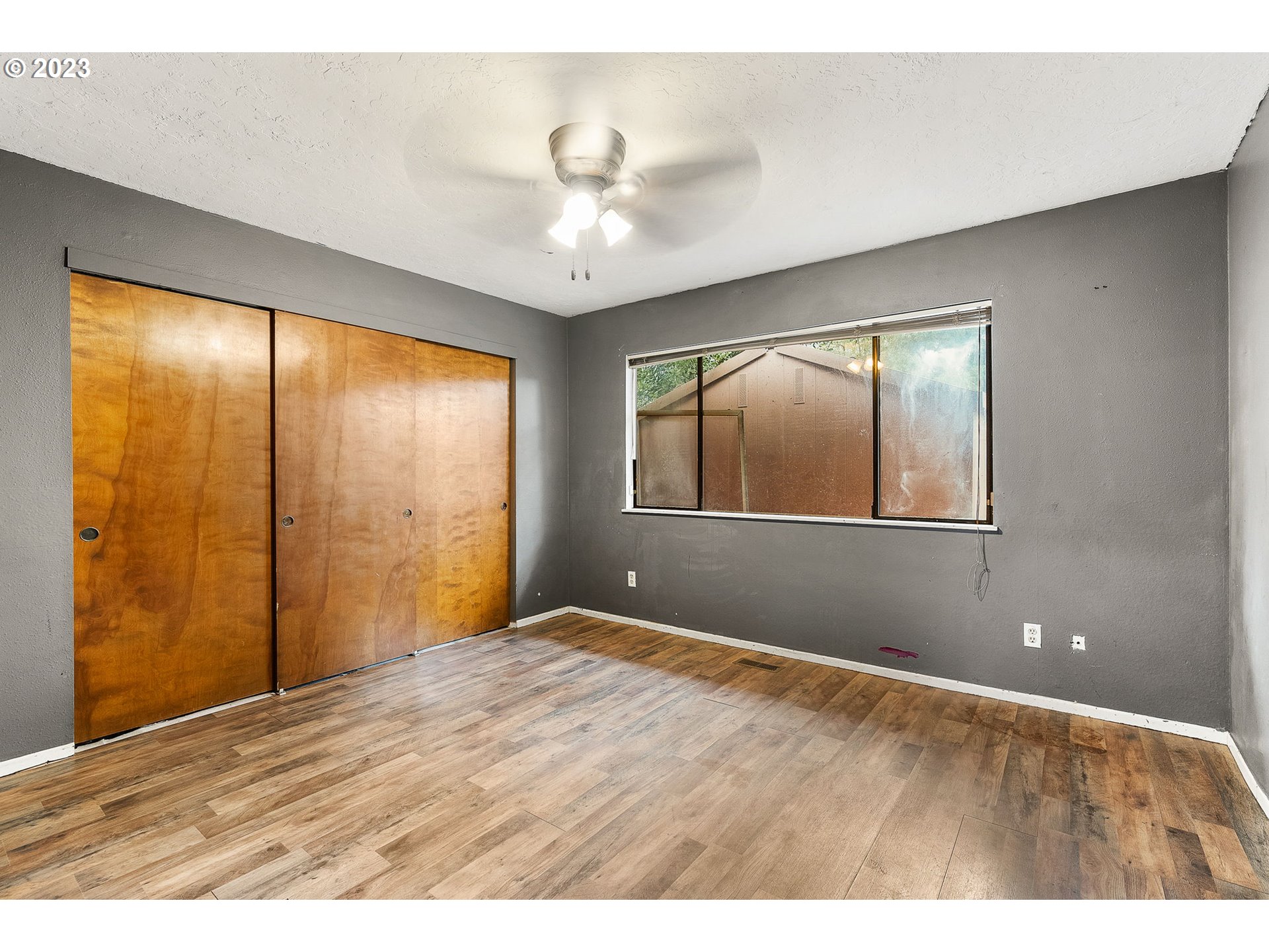 2720 Southeast Palmquist Road Gresham, OR 97080 - Photo 11 of 15 a view of an empty room with a window