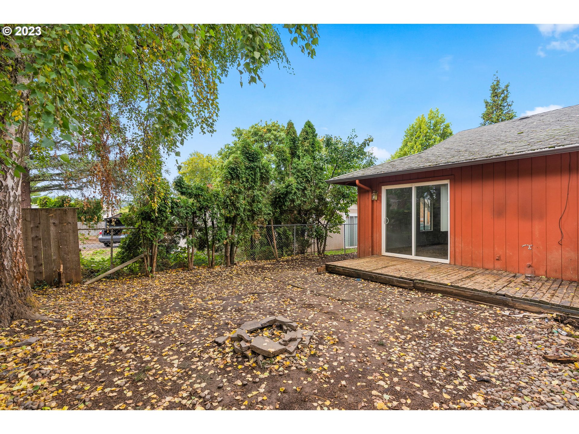 2720 Southeast Palmquist Road Gresham, OR 97080 - Photo 15 of 15 a backyard of a house with lots of green space