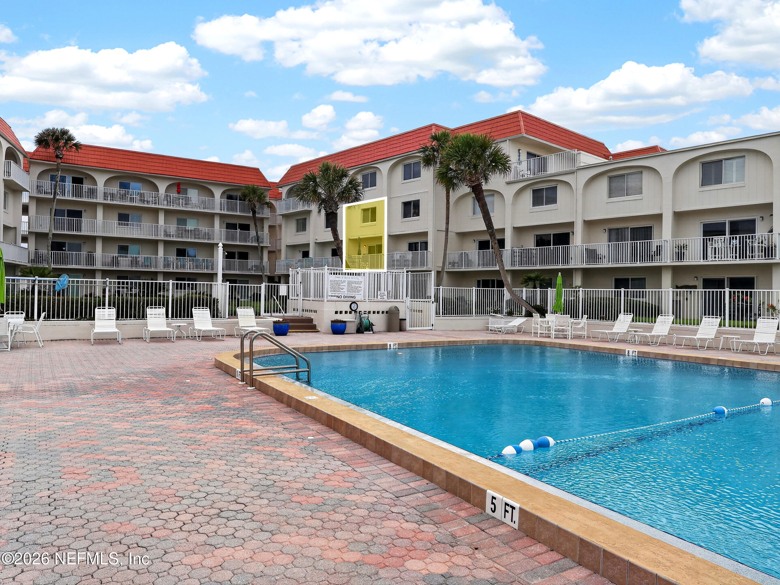 1 Ocean Trace Road, Unit 230 St. Augustine Beach, FL 32080 - Photo 35 of 50 a view of building with swimming pool and sitting area