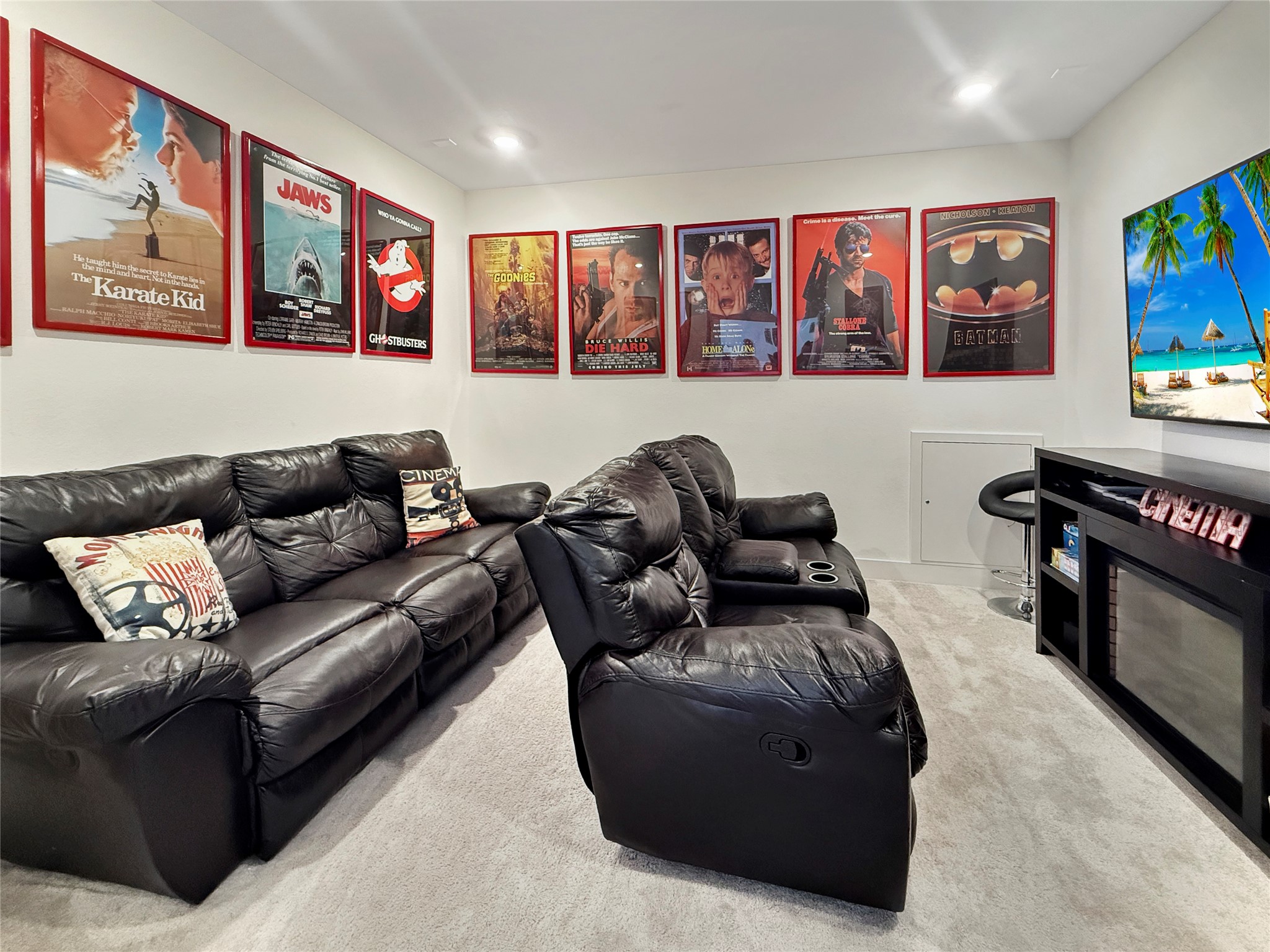 26918 Swanborough Road Spring, TX 77389 - Photo 27 of 50 Upstairs, a dedicated media room with plush leather reclining seating and plenty of room for movie nights offers the perfect flex space for entertainment.