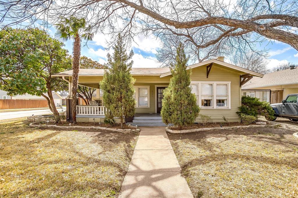 4601 Pershing Avenue Fort Worth, TX 76107 - Photo 1 of 1 a view of a house with a yard covered in snow