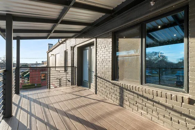 a view of a street with cars
