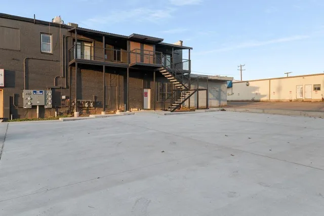 a view of a building with a street