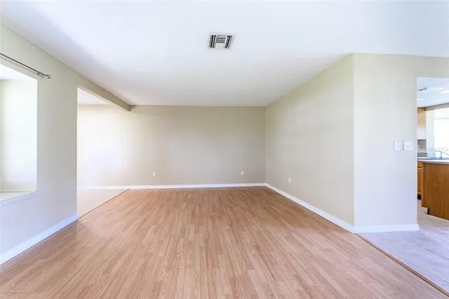 a kitchen with a refrigerator stove and sink