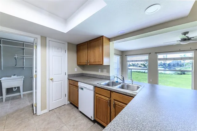a kitchen with granite countertop cabinets and stainless steel appliances
