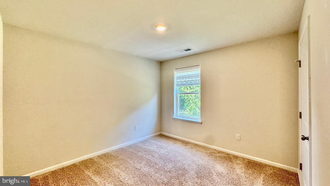 1236 Pimpernell Path Middletown, DE 19709 - Photo 25 of 37 a view of an empty room with a window