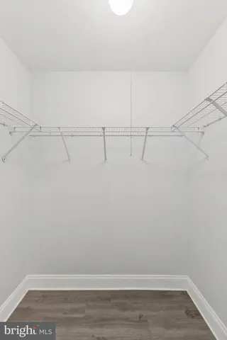 a view of a room with racks on the wall