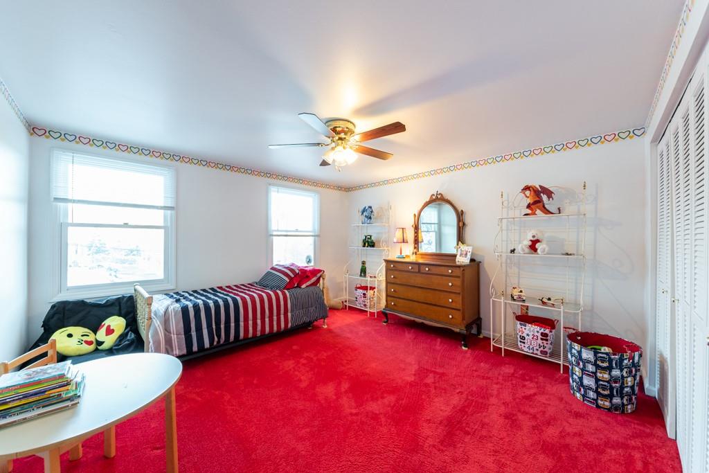 614 Ravencrest Road Pittsburgh, PA 15215 - Photo 17 of 25 a bedroom with furniture and a window