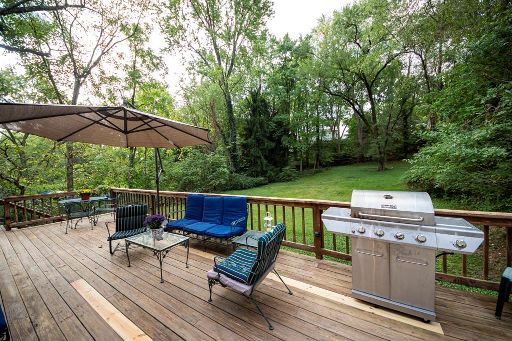614 Ravencrest Road Pittsburgh, PA 15215 - Photo 21 of 25 an outdoor sitting area with furniture and umbrella