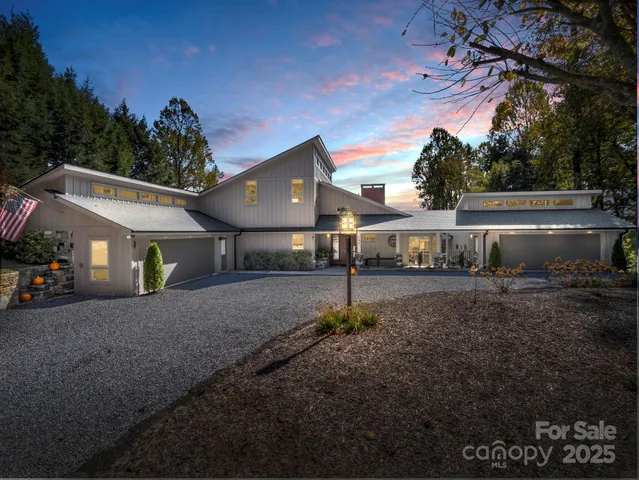 a view of a town with large trees