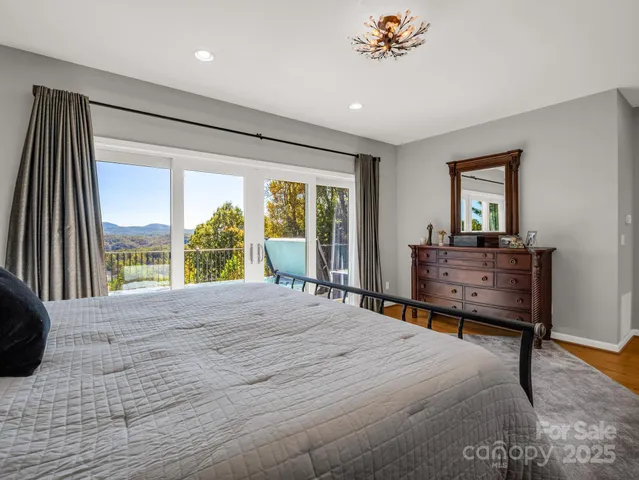 a bathroom with double sink and a mirror