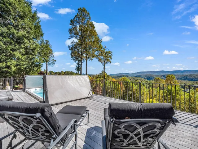 a living room with couch and a rug