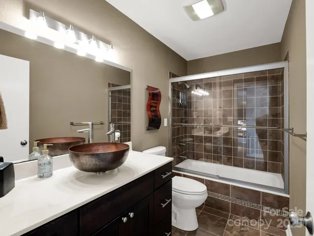 a room with furniture and a large window