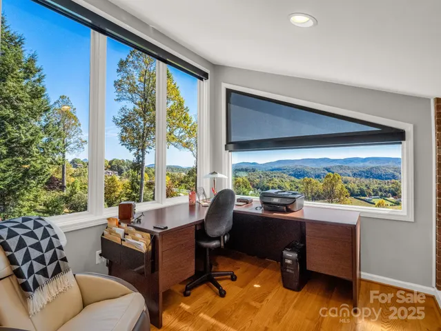 a outdoor space with lots of tables and glass door