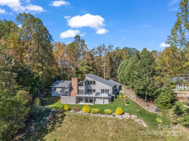 a house with trees in the background