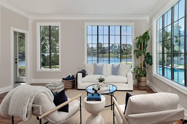 a living room with furniture and a window
