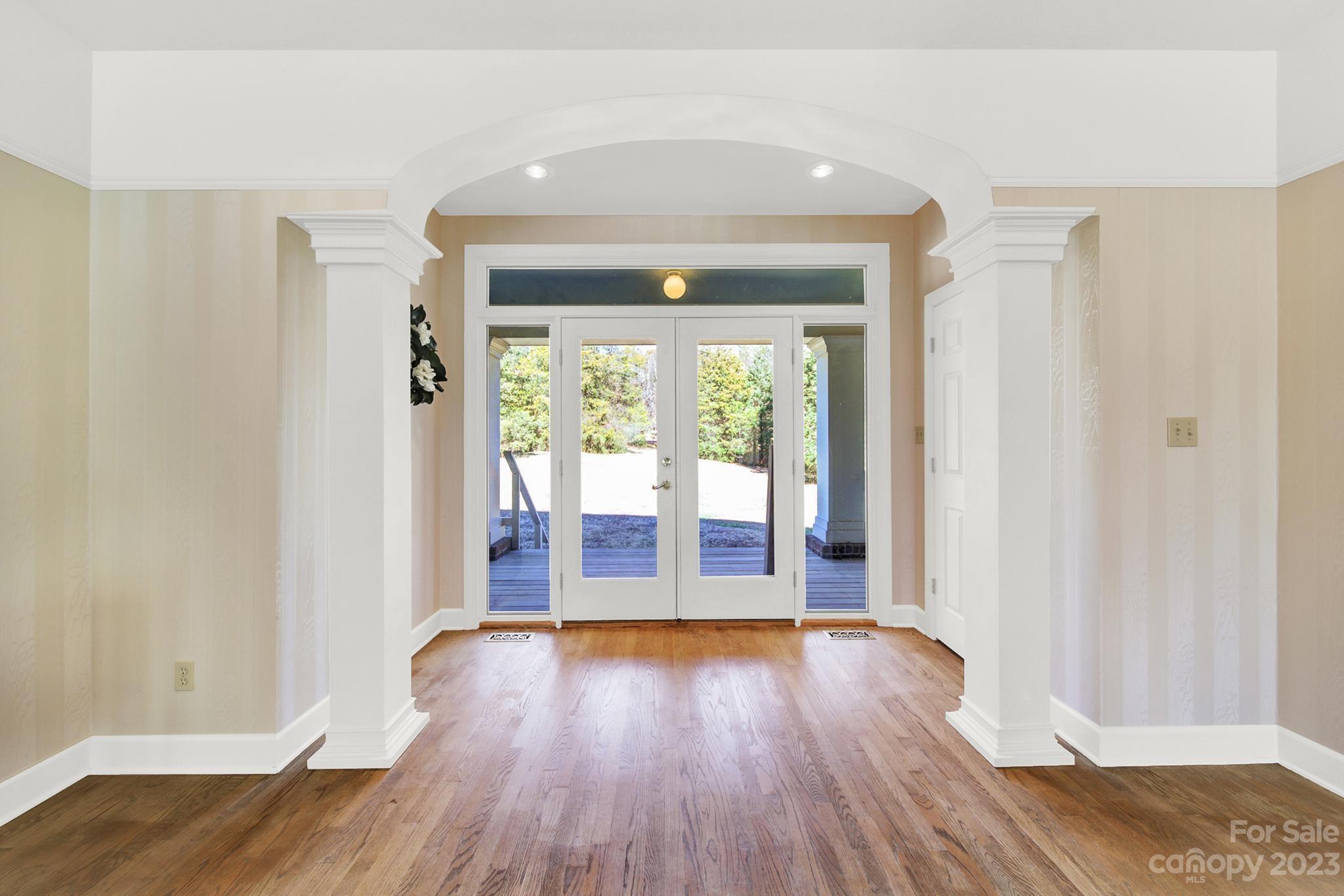 4594 Reid Road Rock Hill, SC 29730 - Photo 4 of 48 wooden floor in an empty room with a window