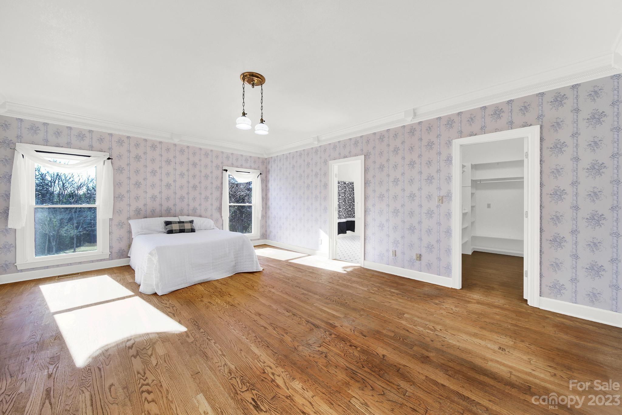 4594 Reid Road Rock Hill, SC 29730 - Photo 10 of 48 a bedroom with a large bed and a window