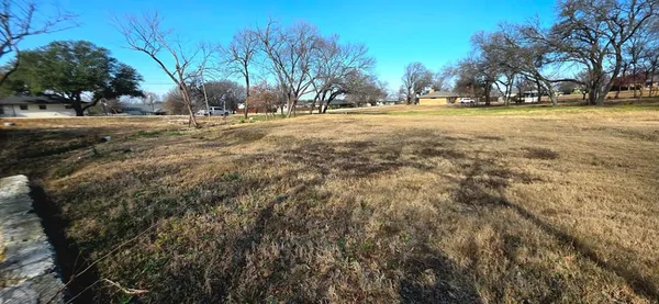 a view of road and trees