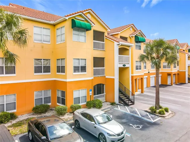 a front view of a building with multiple windows