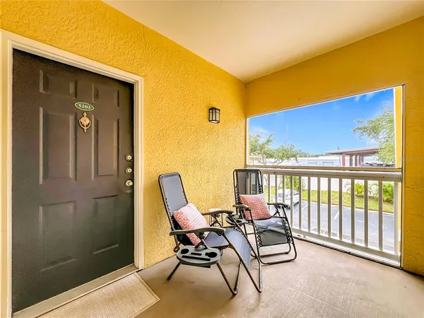 a building outdoor space with patio furniture