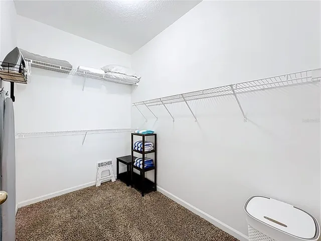 a view of a walk in closet