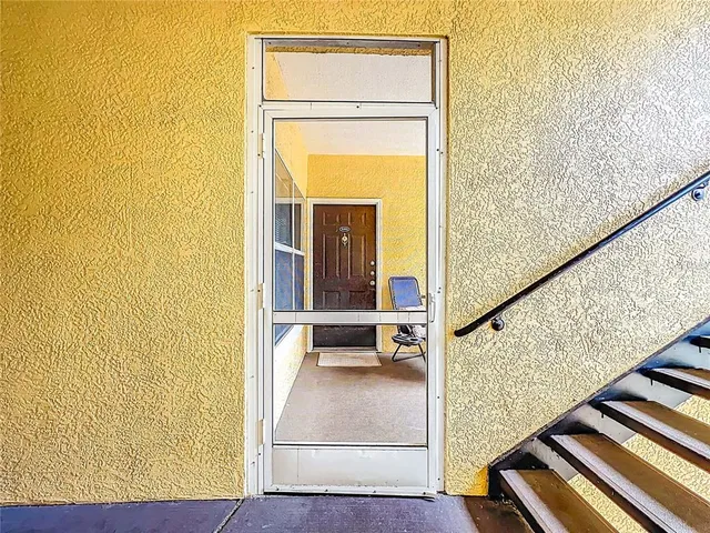 a view of a living room with a couch