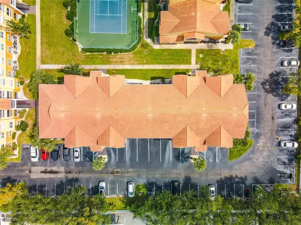 an aerial view of a houses with outdoor space