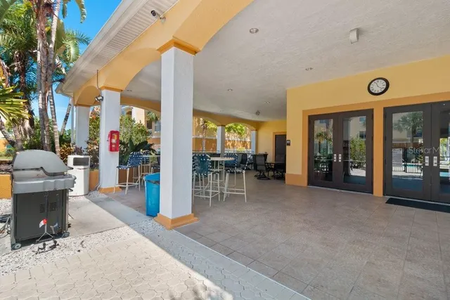 a lobby with furniture and window