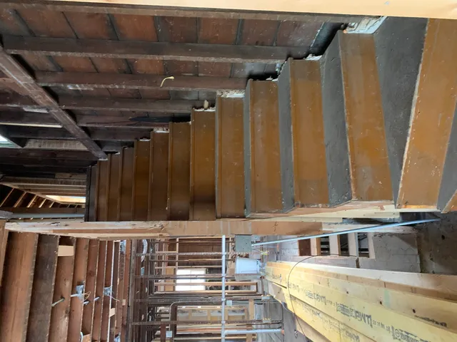 a view of a balcony with furniture