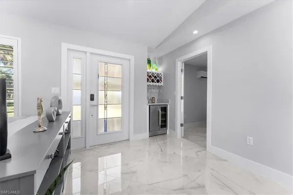 a spacious bathroom with a glass door shower