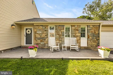 a front view of a house with patio