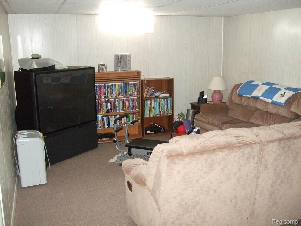 9406 Ruth Avenue Allen Park, MI 48101 - Photo 23 of 31 BASEMENT RECREATION AREA. SOFA AND TELEVISION WILL STAY.