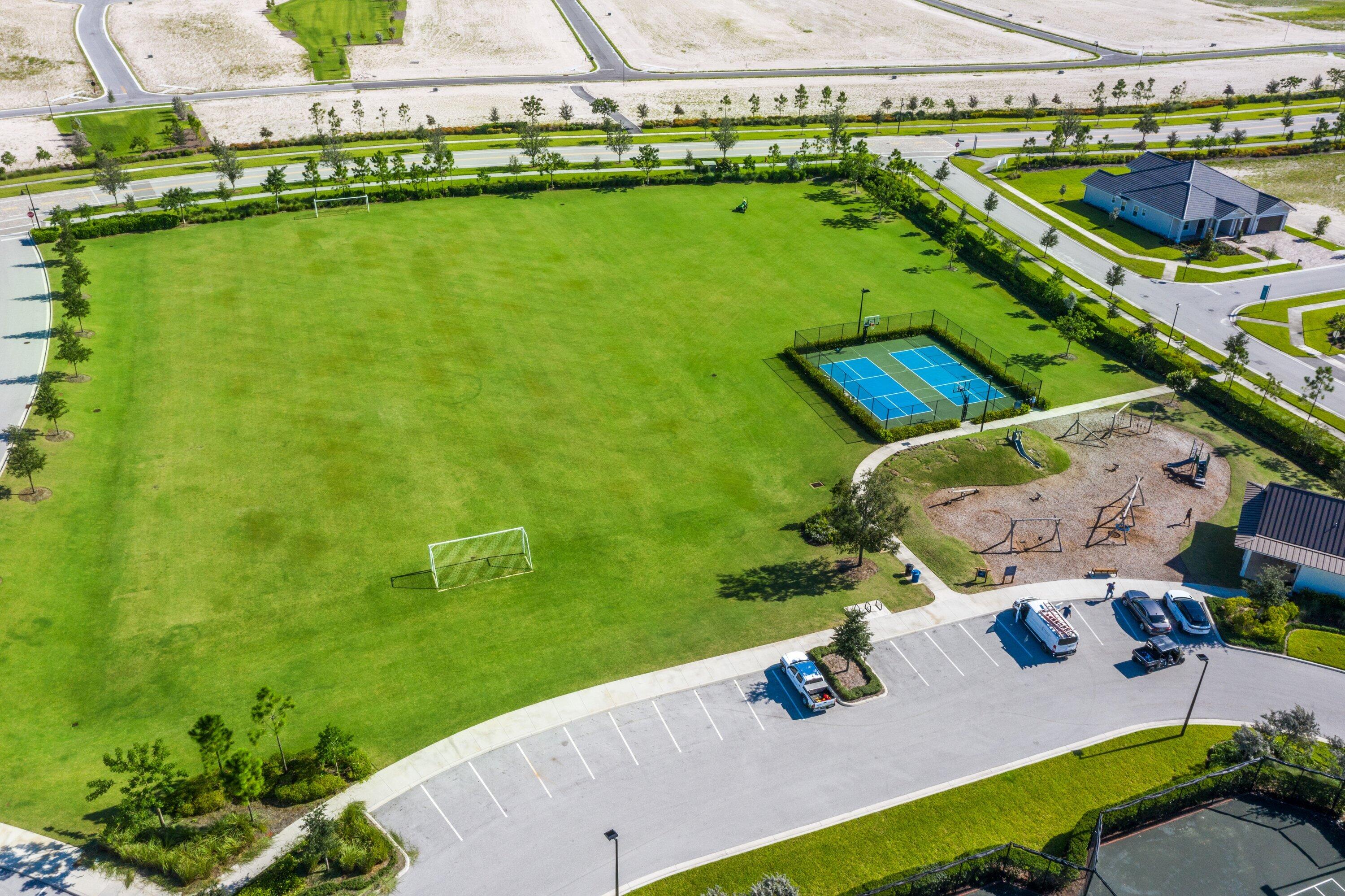 1063 Ember Ridge Run Loxahatchee, FL 33470 - Photo 55 of 76 PICKEBALL AND SOCCER FIELD