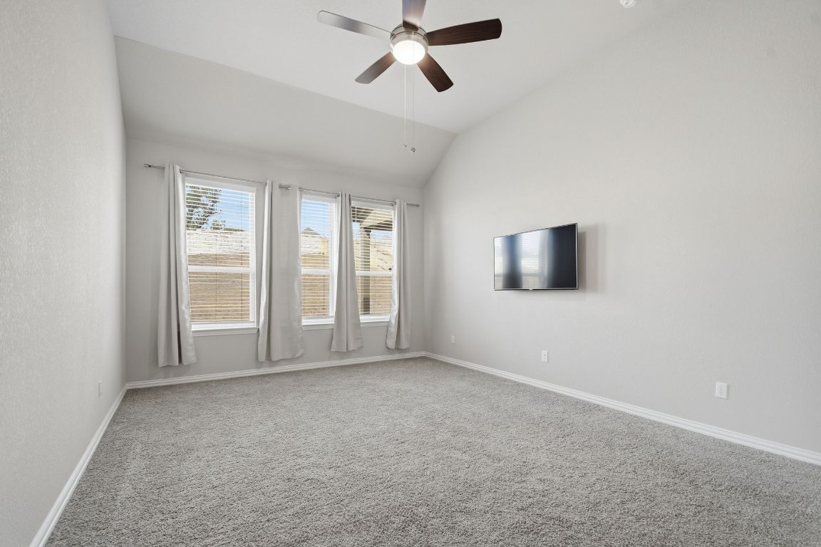 1009 Calendula Trail Georgetown, TX 78628 - Photo 15 of 31 a view of an empty room with a window