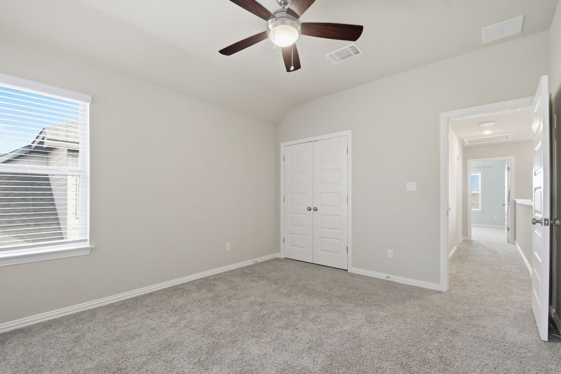 1009 Calendula Trail Georgetown, TX 78628 - Photo 25 of 31 a view of an empty room with a window
